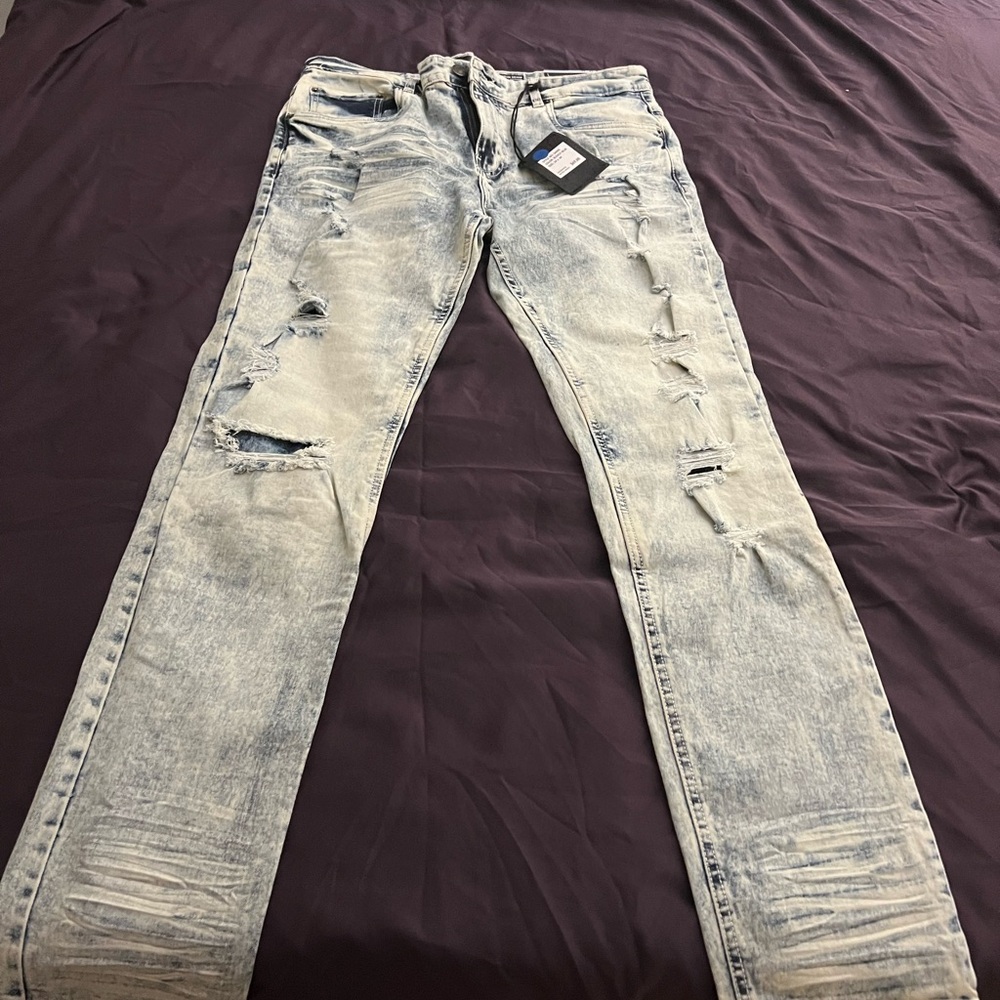 Distressed Light Blue Jeans for Men